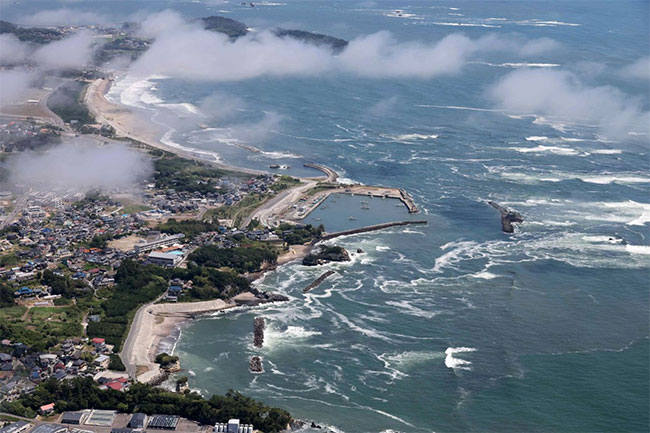 Tsunami warnings disrupt US West Coast and Hawaii travel, with flights diverted