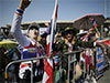Protesters in Bangkok demand resignation of court-suspended prime minister following deadly conflict