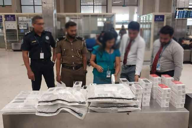 Man held at BIA with mobile phones and cardamom worth Rs. 20M