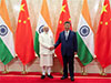 India committed to improving ties with China, Modi tells Xi
