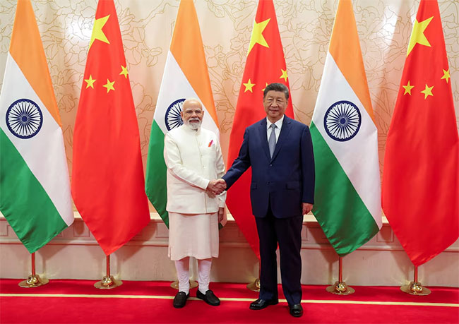 India committed to improving ties with China, Modi tells Xi
