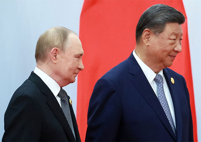 China’s Xi, Russia’s Putin share vision for new global order at security forum
