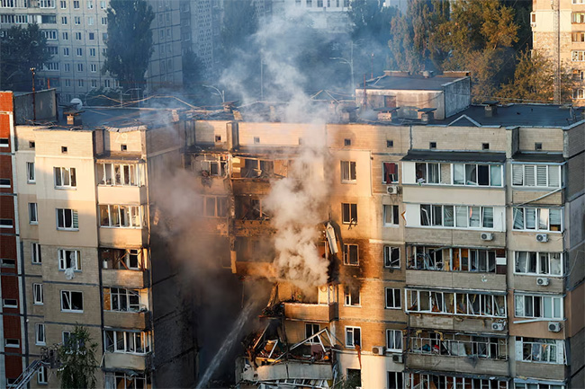 Infant among three killed in Russian attack that sets ablaze seat of Ukraine government
