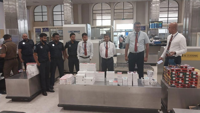 Two passengers held with mobile phones, tablets and cosmetics worth Rs. 5M at BIA