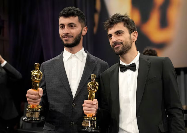 Oscar-winning Palestinian director Basel Adra says his home in West Bank raided by Israeli soldiers