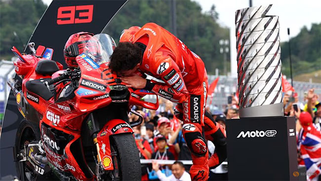 Marc Marquez wins seventh MotoGP title to equal Valentino Rossi