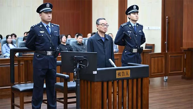 Chinas former agriculture minister gets suspended death sentence for bribery