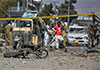 Car bomb kills 10 in Pakistan after militants trigger shootout with troops