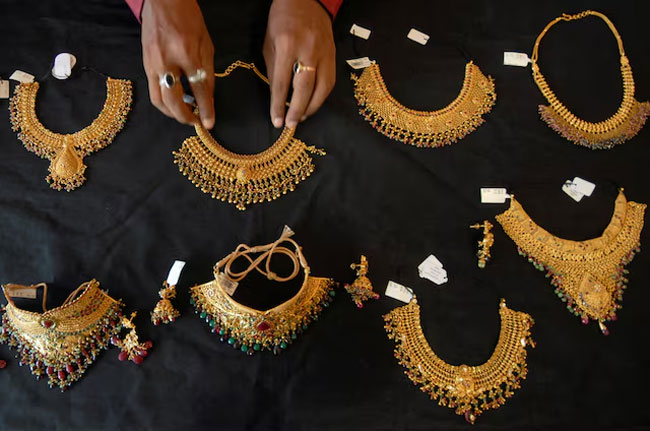 Gold builds on historic rally, soars past ,000 an ounce for first time