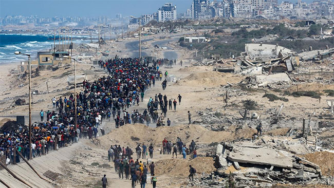 Israel says Gaza ceasefire in effect, troops to withdraw