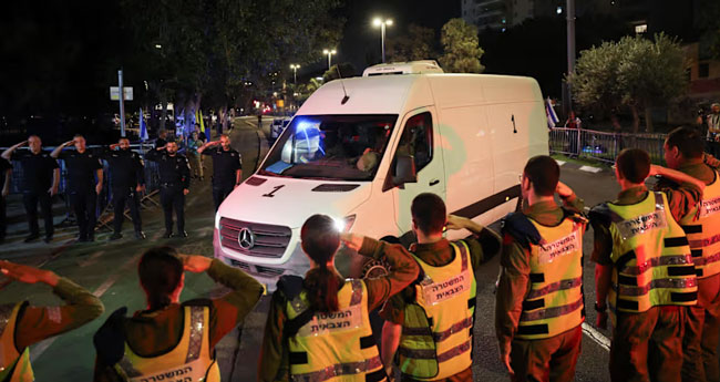 Hamas hands over hostage bodies after Israel threatens aid cut
