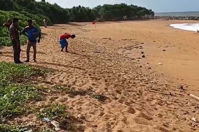 Police recover suspected narcotics parcel washed ashore in Bentota