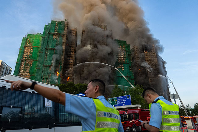 Fire rages through Hong Kong high-rise, leaving 4 dead
