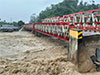 Landslides and flash floods on Indonesias Sumatra island leave at least 10 dead and 6 missing