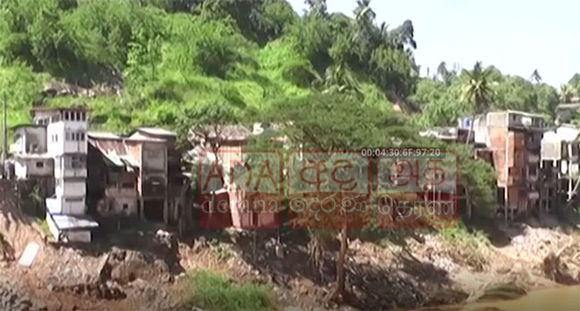 Buildings in Peradeniya along Mahaweli River banks at risk of collapsing