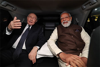 Russias Putin arrives in India for summit talks with PM Modi
