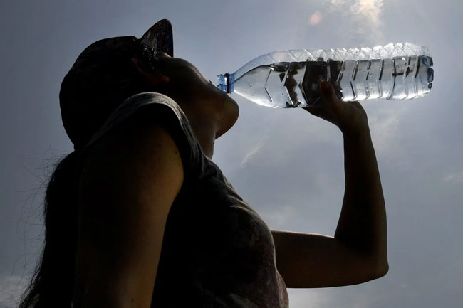 Bottled water drinkers ingest 90,000 more microplastic particles each year, study finds
