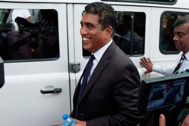 Five police teams deployed to arrest ex-Minister Johnston Fernando