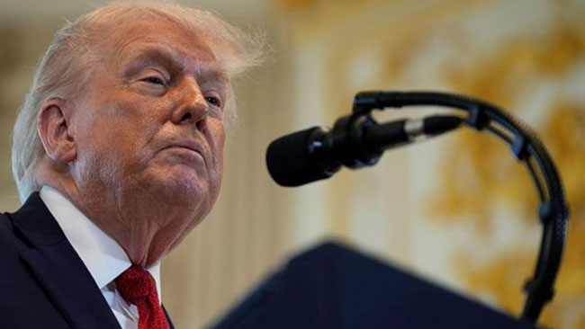 Trump says he will 100%  carry out Greenland tariffs threat, as EU vows to protect its interests