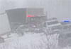 Heavy snow in US strands drivers in 100-vehicle crash