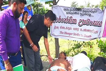 Opposition Leader Sajith meets school dev. officers on hunger strike