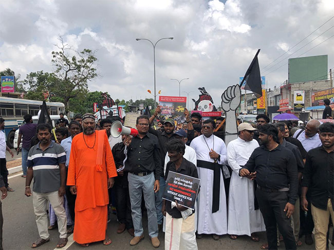 Relatives of missing persons stage �black flag� protest in Kilinochchi