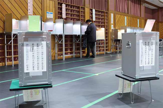 Japan�s governing party projected to win snap election majority