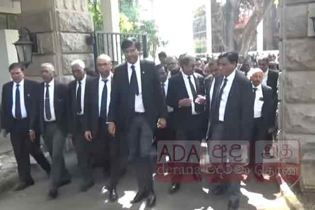 Lawyers stage protest march over killing of lawyer and wife in Akuregoda