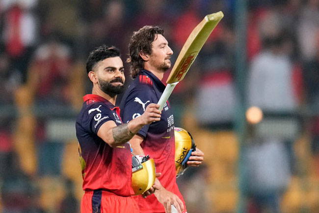 Kohli hits fifty as RCB open IPL with impressive win