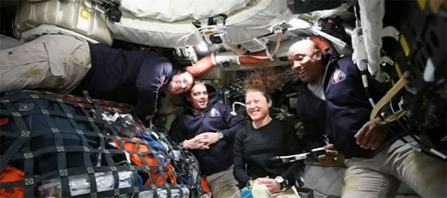 Artemis capsule boost puts astronauts moon-bound for record-breaking journey