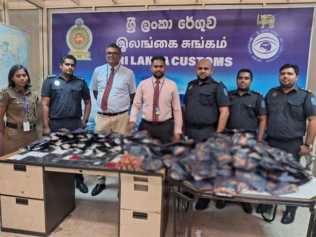 Two Chinese passengers arrested at BIA over contraband including used iPhones 