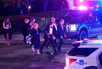 Trump safe after being rushed from White House correspondents dinner as attendees take cover