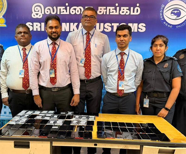 Three Chinese nationals arrested at BIA with 87 mobile phones 